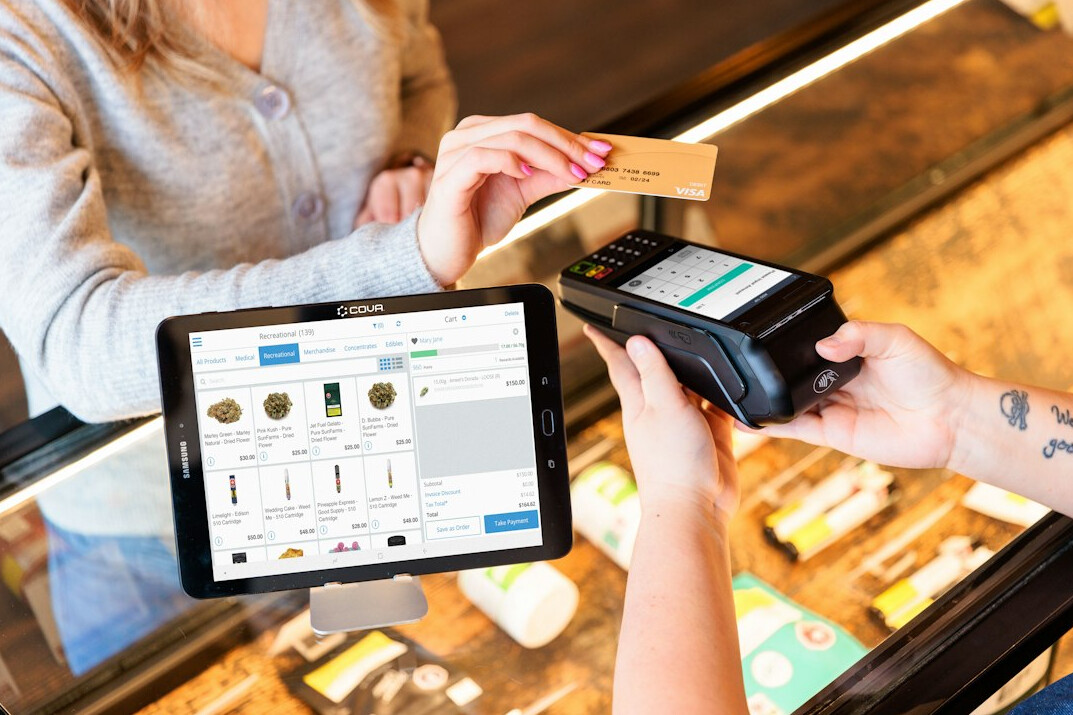Hands filling a digital claims form on a tablet