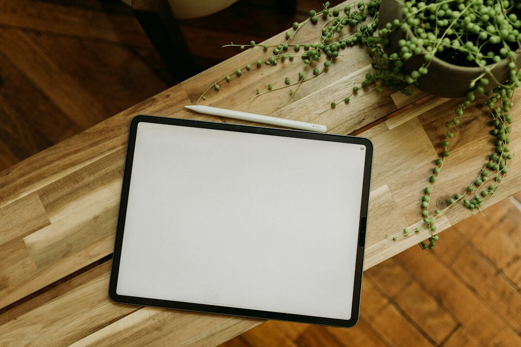 Tablet showing a digital underwriting dashboard