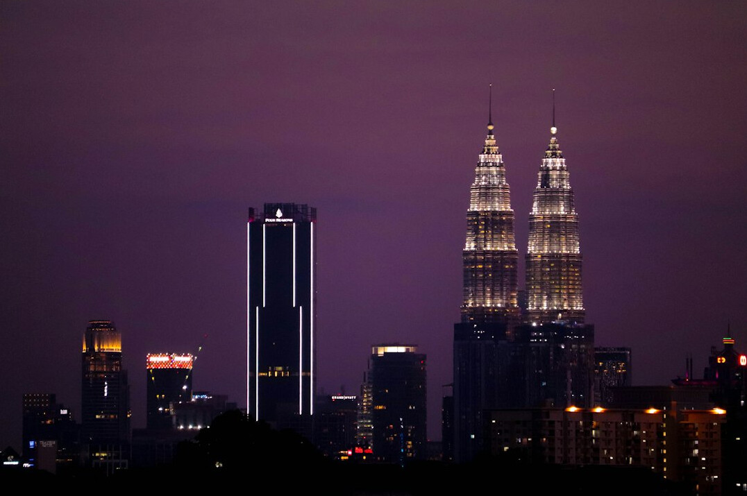 Kuala Lumpur city skyline with modern skyscrapers at dusk